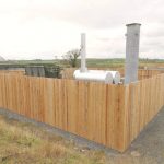 Photo shows a landfill gas recovery compound..