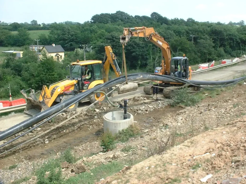 Perimeter Landfill gas collection main raising for positioning.